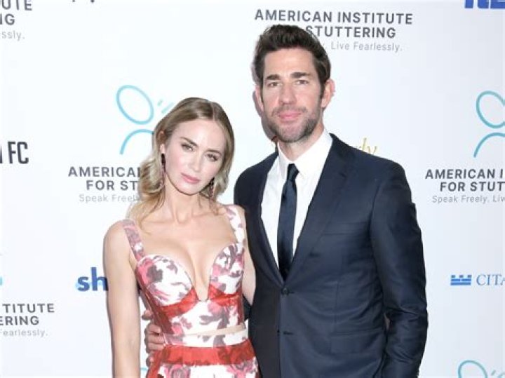 Emily Blunt and John Krasinski try not to let their kids know they’re famous