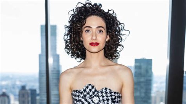 Emmy Rossum has curly hair now too, but hers is natural and not a perm