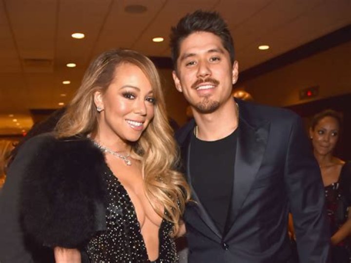 Mariah Carey poses on a yacht with her on-again boyfriend Bryan Tanaka