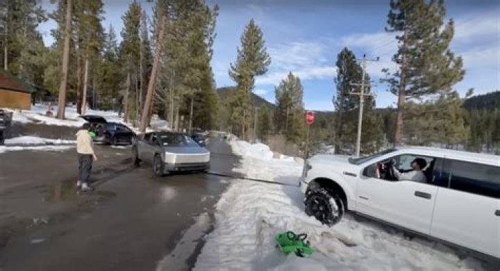 National Forest Service posts a video of a Ford towing a Cybertruck stuck in the snow