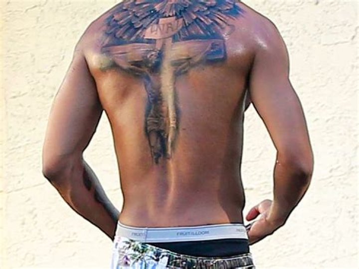 Nick Cannon spent 30 hours getting his “Mariah” back tattoo covered up