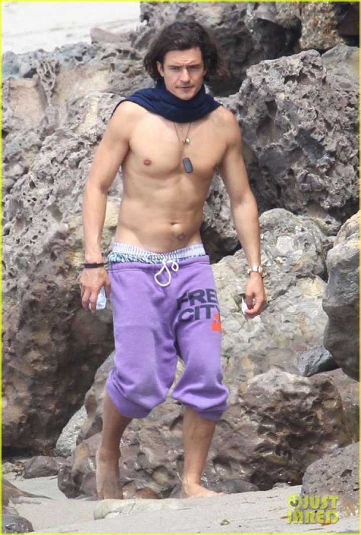 Orlando Bloom goes shirtless, wears lavender Free City sweats: would you hit it?
