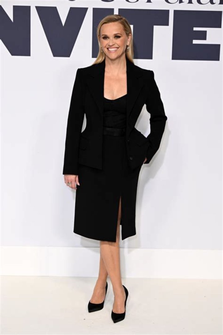 Reese Witherspoon in a cobalt blue dress and navy blazer: adorable and professional?