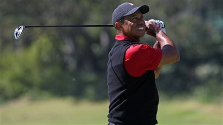 Tiger Woods apologized after handing a tampon to his golf buddy Justin Thomas