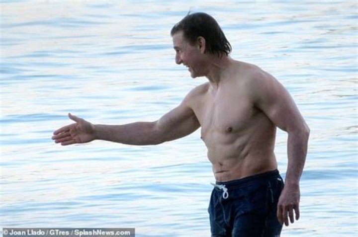 Tom Cruise is shirtless again, still oddly lumpy & strange